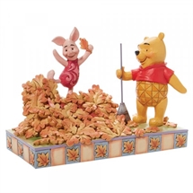 Disney Traditions - Piglet playing in a pile of leaves